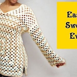 May include: A crocheted sweater with a loose fit and a v-neck. The sweater is made with a white yarn and has a light brown and light blue pattern. The text "Easiest Sweater Ever!" is on a yellow background.