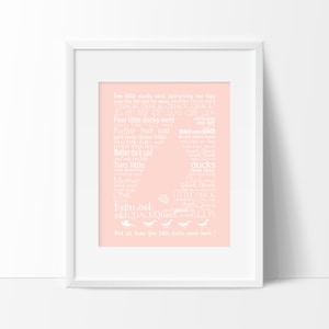 May include: A pink nursery print with white text featuring the lyrics to the children's rhyme "Five Little Ducks". The text is arranged in a duck shape.