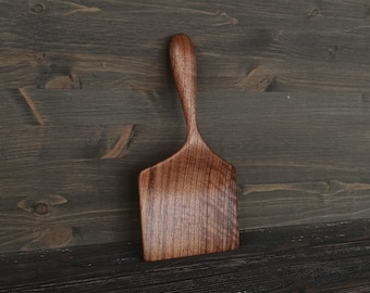 Wide baking spatula carved from walnut wood Cooking spatula