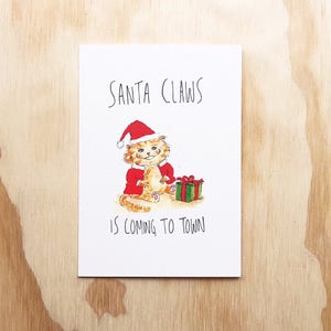 Santa Claws komt naar de stad | grappige kerstkaart | grappige kerstkaart | grappige kerst wenskaart | kerstkaart | kat kerstkaart