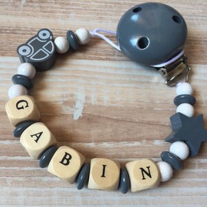 Pacifier clip-pacifier with the name Lucas wooden beads