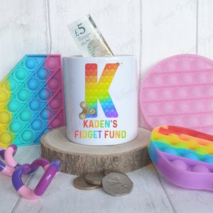 Personalised Fidget Pop It Ceramic Money Box: Birthday Gift