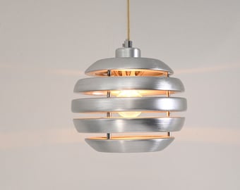 One of three vintage brushed aluminum pendant / hanging lamp by Eglo Leuchten Germany, 2000s