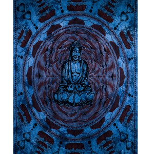 May include: A blue tapestry featuring a seated Buddha figure at the centre. The Buddha is surrounded by a detailed mandala design in shades of blue and burgundy. The background has a tie-dye effect.