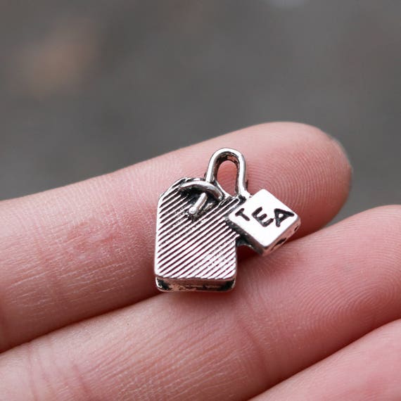 BULK 20 Running man charms antique silver tone SP127