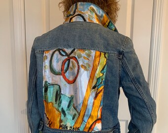 Olympic Scarf on denim jean jacket with scarf accents, scarf with a story