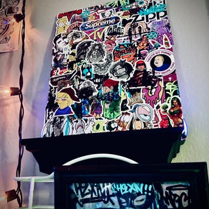 Sticker Collage Mash_Up! Various artists Supreme, Kaws, Garfield,, 90s nostalgic aesthetic.