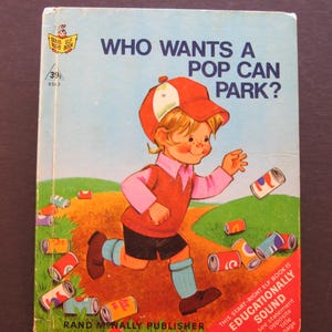 May include: A vintage children's book cover with a colorful illustration of a boy in a red cap and a pink shirt throwing a pop can into a trash can. The book title is "Who Wants a Pop Can Park?" and the text "This Start-Right Elf Book is Educationally Sound" is on the right side of the cover.