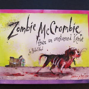 May include: A children's book titled "Zombie McCombie from an overturned Kombi" with a watercolor illustration of a zombie dog. The cover features a pink and yellow border, with the author's and illustrator's names.