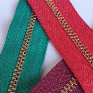 Liquidation de fermetures éclair rouge, bordeaux et verte YKK de 22 cm
