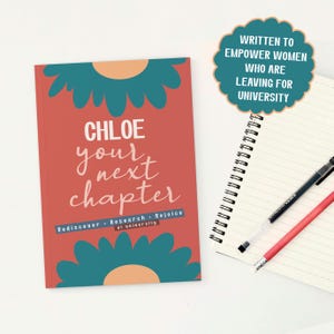 May include: A book titled "Chloe, your next chapter" with teal and orange floral accents. The book is on a white surface next to a spiral notebook, a black pen, and a red pen. The text "Written to empower women who are leaving for university" is in a teal bubble.