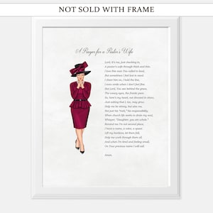 Peut inclure: Impression encadrée avec une illustration d'une femme en robe et chapeau bordeaux, et un poème intitulé "A Prayer for a Pastor's Wife". Le texte est en police serif classique, sur fond crème.