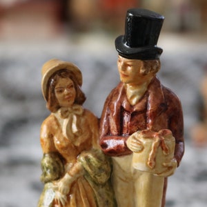 Sebastian Miniatures 1947 - SML-89  R.H. Stearns 1847 Couple Centennial Figurine Couple Shopping in Boston