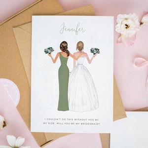 May include: A wedding invitation card with two women, one in a green dress and the other in a white gown, holding bouquets. The text "Jennifer" is written at the top, with the message "I couldn't do this without you by my side. Will you be my bridesmaid?"
