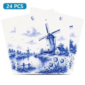 May include: A stack of 24 white paper napkins with a blue and white windmill landscape design. The napkins feature a detailed illustration of a Dutch windmill, river, and flowers. The text "24 PCS" is in a blue oval.