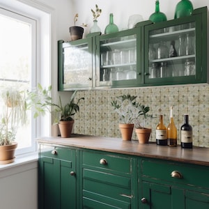 May include: A green kitchen cabinet with glass-fronted upper cabinets and a wooden countertop. The cabinets are filled with glass jars and bottles. Potted plants and bottles of wine are on the countertop. A window is on the left.