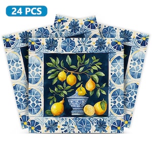 May include: Set of 24 blue and white ceramic coasters with a lemon tree design. The coasters feature a watercolor style illustration of a lemon tree with lemons and leaves. The background is a blue and white tile pattern.