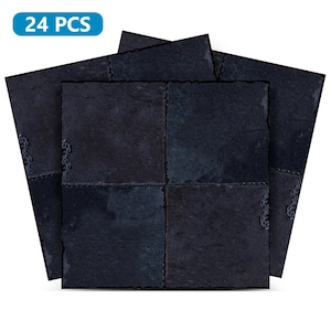 May include: A set of 24 black slate tiles, each with a textured surface. The tiles are arranged in a staggered pattern, creating a unique and modern look.