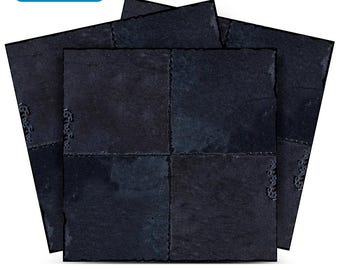 May include: A set of 24 black slate tiles, each with a textured surface. The tiles are arranged in a staggered pattern, creating a unique and modern look.