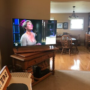 Wooden swivel 2024 tv stand
