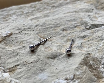 Tiny round silver pebble stud earrings