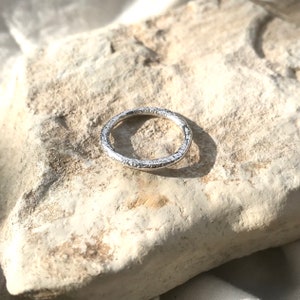 Molten silver ring in recycled sterling silver