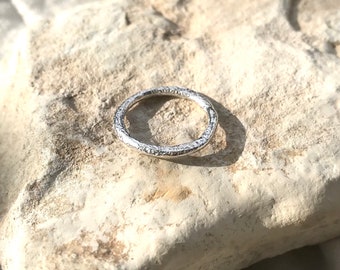 Molten silver ring in recycled sterling silver