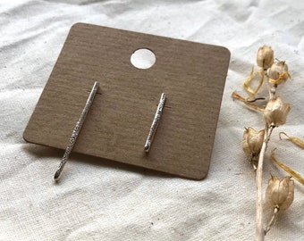 Asymmetric molten silver post earrings