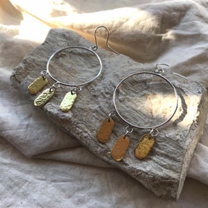 Sun ray statement chandelier earrings