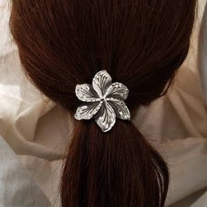 Plumeria flower pony-tail cover