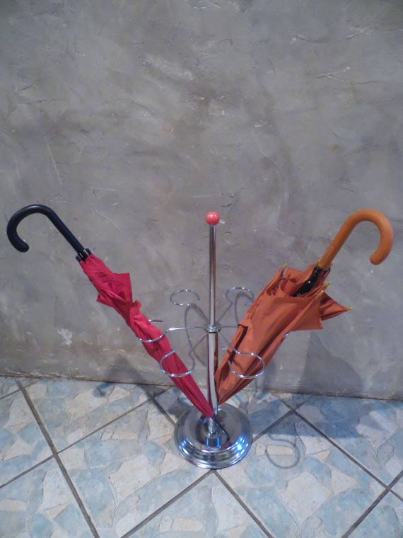 Has umbrellas 70s chromed metal, orange, coral bal
