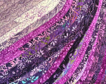 Cinco preciosos manteles individuales batik morados y multicolor. Fabricados con un rollo de gelatina. ¡Compra gratis!
