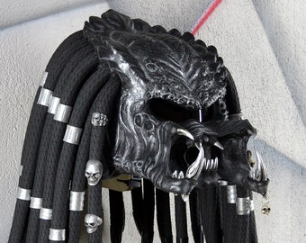 Custom predator moto helmet. DOT & ECE certified. Painted Raptor u-pol super durable covering.