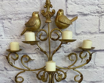 Candelabro escalonado vintage dorado con pájaros