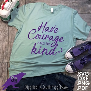 May include: A light green t-shirt with the words "Have Courage AND BE kind" in purple script. The shirt is paired with dark blue jeans and purple sneakers. Digital cutting file formats are listed at the bottom.
