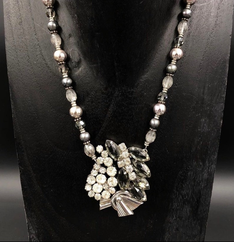 Play on Gray Necklace made from three clip-on earrings to create a pendant strung on mixed beads