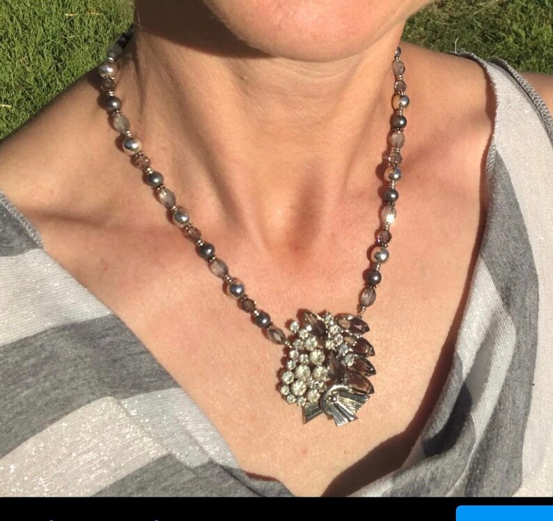 Play on Gray Necklace made from three clip-on earrings to create a pendant strung on mixed beads