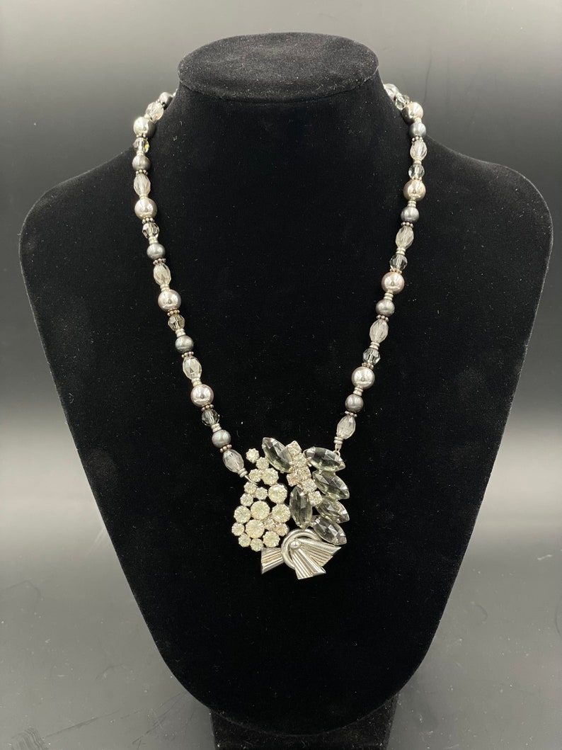 Play on Gray Necklace made from three clip-on earrings to create a pendant strung on mixed beads
