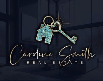 May include: A gold logo design for a real estate company called "Caroline Smith Real Estate". The logo features a stylized house key with a sparkling blue and gold design. The text "enjoy the process" is written in gold script above the logo.