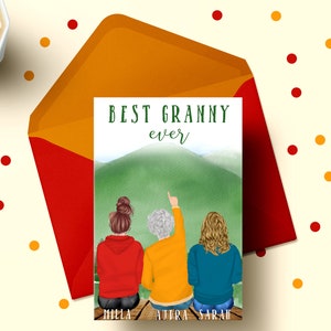 May include: A card with a watercolor background of a green mountain with three women standing in front of it. The women are wearing red, yellow, and blue shirts. The text on the card reads "BEST GRANNY ever" with the names "MILLA, AURA, SARAH" at the bottom.