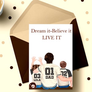 May include: A white card with the text "Dream it-Believe it LIVE IT" and a cartoon illustration of three people wearing baseball jerseys with the numbers 01, 02, and 03. The person wearing the jersey with the number 01 has the word "DAD" on the back of the jersey.