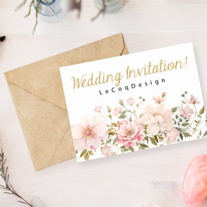 May include: A white card with gold lettering that reads "Wedding Invitation! LeCoqDesign". The card is decorated with a watercolor floral border of pink and white flowers.