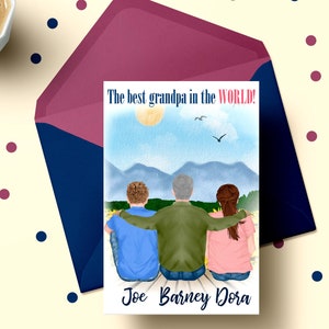 May include: A watercolour illustration of three people standing in front of a mountain range. The text "The best grandpa in the WORLD!" is at the top of the card. The names "Joe, Barney, Dora" are at the bottom of the card.