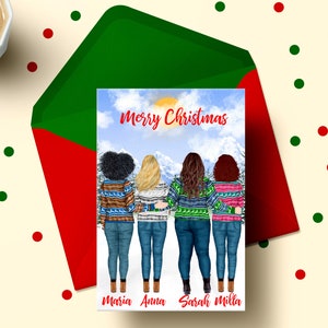 May include: A Christmas card featuring four women wearing colorful sweaters and jeans, standing together with their arms around each other. The card has the text "Merry Christmas" at the top and the names "Maria, Anna, Sarah, Milla" at the bottom.