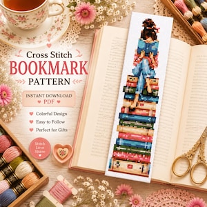 May include: A cross stitch bookmark pattern featuring a person with a dark bun hairstyle reading a book while sitting atop a tall stack of colorful books. The design includes text reading Cross Stitch BOOKMARK PATTERN INSTANT DOWNLOAD PDF.