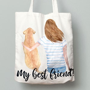 May include: White tote bag with a watercolor illustration of a woman and a dog. The woman has long brown hair and is wearing a blue and white striped shirt and blue jeans. The dog is a golden retriever. The text "my best friend!" is printed on the bag.
