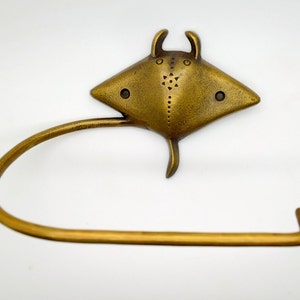 Sting Ray toilet roll holder. Solid brass bathroom decor supplied with fitting screws. Choose from 5 designs.