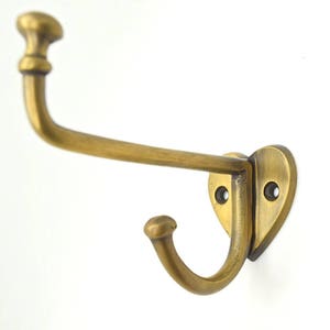 Wall hooks . x1. Brass door hooks,.Clothes coat hooks. Bedroom decor. Wall art. Brass handles. Drawer handles . Towel hooks . Vintage brass image 1