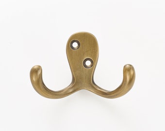 Solid brass wall hooks. Ideal for small spaces to hang coats, clothes and towels. Supplied with fixings. Great bathroom decor hooks