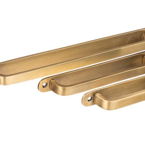 Brass drawer handles. Backplate drawer pulls to cover existing holes. A range of sizes available to suit your kitchen makeover